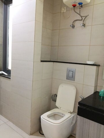 Bathroom in 3 BHK Apartment at DLF Hamilton Court, Sector 27 – for Sale
