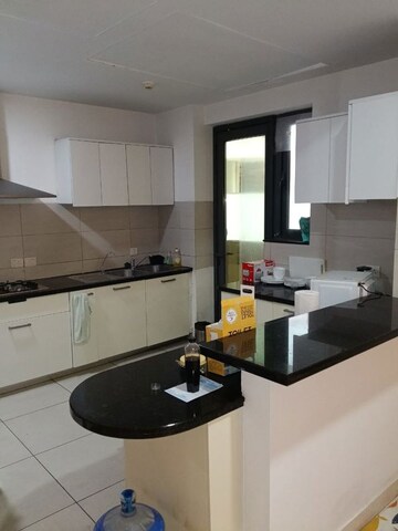 Kitchen in 3 BHK Apartment at DLF Hamilton Court, Sector 27 – for Sale