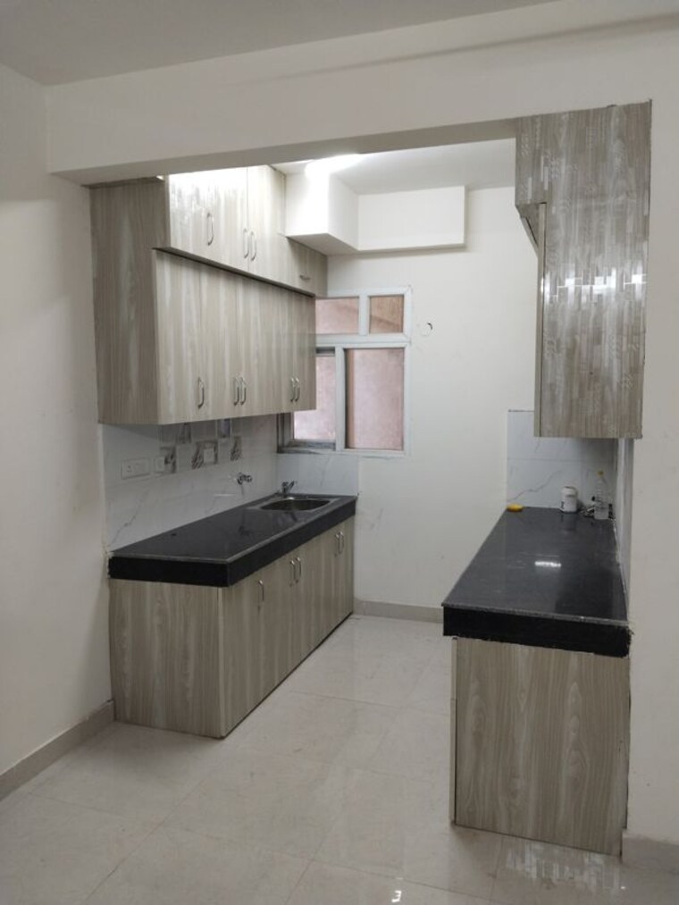 Kitchen, vatika-inxt-emilia-floors 2 Bedroom 929 Sq.Ft. Apartment In Sector 82 Gurgaon 9724705