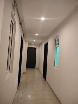 Building Lobby in 2 BHK Apartment at Krisumi Waterfall Residences, Sector 36a – for Rent