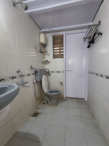 Bathroom in 1 BHK Apartment at Vedant Complex CHS, Samata Nagar – for Rent