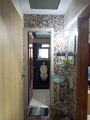 Living Room in 2 BHK Apartment at Rustomjee Erika, Bandra East – for Rent