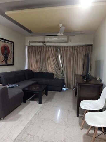 Living Room in 2 BHK Apartment at Rustomjee Erika, Bandra East – for Rent