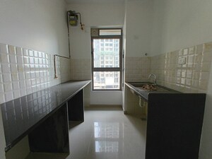 Kitchen in 2 BHK Apartment at Kalpataru Immensa C, Kolshet Road – for Sale