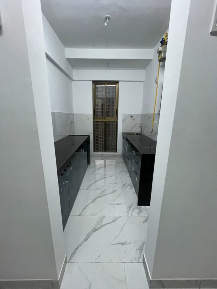 Kitchen, raymond-ten-x-habitat 2 Bedroom 635 Sq.Ft. Apartment In Pokhran Road No Two Thane 9725053