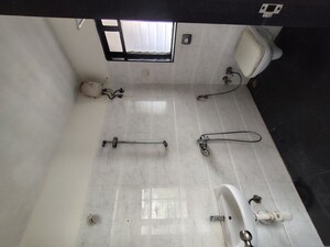 Bathroom in 2 BHK Apartment at DB Orchid Suburbia, Kandivali West – for Rent