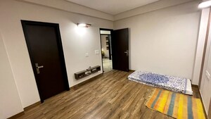 Bedroom in 4 BHK Builder Floor at Ansal API Esencia, Sector 67 – for Rent