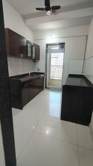 Kitchen in 3 BHK Apartment at Rustomjee Urbania Azziano, Thane West – for Rent
