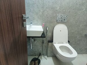 Bathroom in 1 BHK Apartment at Omkar Signet, Malad East – for Rent