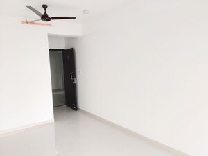 Room in 2 BHK Apartment at UK Iridium, Kandivali East – for Rent