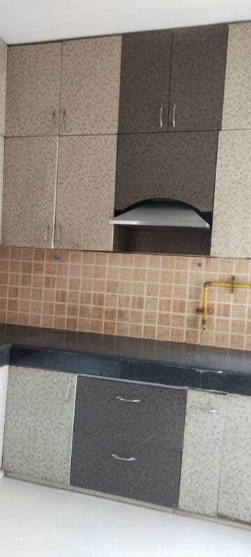 Kitchen in 3 BHK Apartment at Mahagun Mywoods, Sector 16c Greater Noida – for Rent