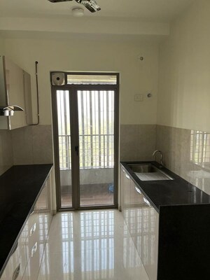 Kitchen in 2 BHK Apartment at Kalpataru Paramount, Kapur Bawdi – for Rent