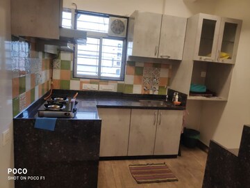 Kitchen in 1 BHK Apartment at Mahavir Kalpavruksha, Ghodbunder Road – for Rent