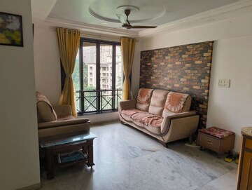 Living Room in 1 BHK Apartment at Hiranandani Estate Crown, Ghodbunder Road – for Sale