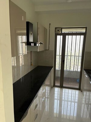 Kitchen in 2 BHK Apartment at Piramal Vaikunth, Balkum Pada – for Rent