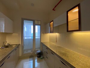 Kitchen in 2 BHK Apartment at Piramal Vaikunth, Balkum Pada – for Rent