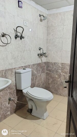 Bathroom in 2 BHK Apartment at Aims Golf City, Sector 75 – for Rent