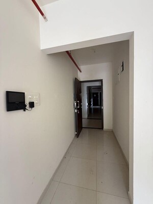 Building Lobby in 3 BHK Apartment at Shapoorji Pallonji Vanaha Golfland, Bavdhan – for Rent