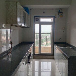Kitchen in 2 BHK Apartment at Dosti West County Phase 4 Dosti Pine, Balkum Pada – for Rent