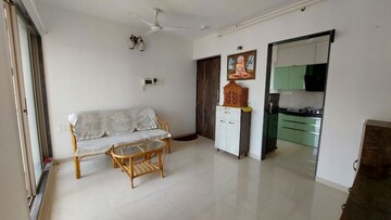 Living Room in 2 BHK Apartment at Runwal Eirene, Balkum Pada – for Rent