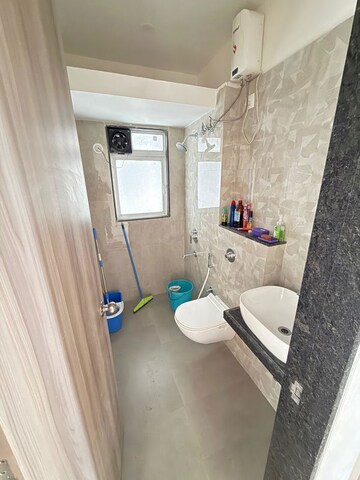 Bathroom in 2 BHK Apartment at Kalpataru Immensa, Kolshet Road – for Rent