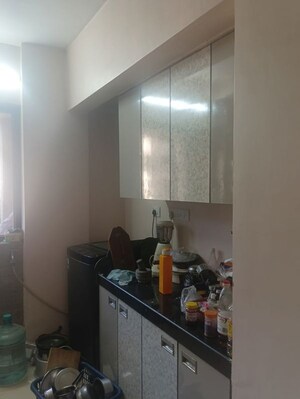 Kitchen in 1 BHK Apartment at Krishna Greenland Park Vastu Federation, Ghodbunder Road – for Rent