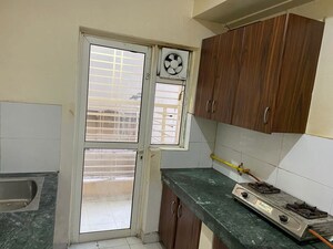 Kitchen in 3 BHK Apartment at Radhey Krishna Casa Green I, Sector 16 Greater Noida – for Sale