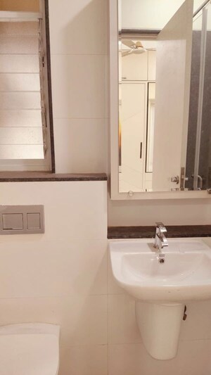 Bathroom in 2 BHK Apartment at Rustomjee Urbania Azziano, Thane West – for Rent