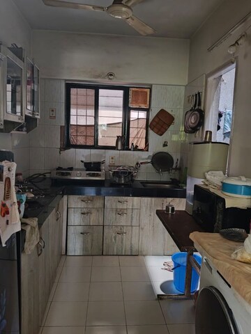 Kitchen in 1 BHK Apartment at Sun City, Sinhagad Road – for Sale