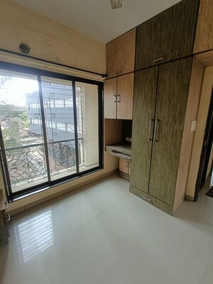 Room in 2 BHK Apartment at Chaitanya Anand Lunkhod CHSL, Andheri West – for Rent