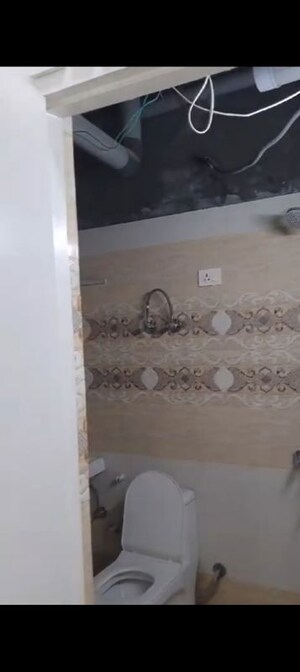 Bathroom in 3 BHK Apartment at Raj Nagar Extension – for Sale