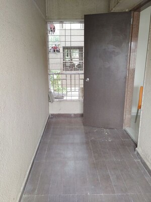 Building Lobby in 2 BHK Apartment at Welwoath Tinseltown, Bavdhan – for Rent