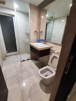 Bathroom in 4 BHK Apartment at Hiranandani Brookhill, Ghodbunder Road – for Rent