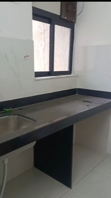 Kitchen in 1.5 BHK Apartment at Runwal Gardens, Dombivli East – for Rent