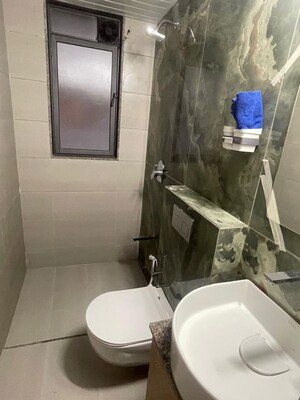 Bathroom in 3 BHK Apartment at Adalaj – for Rent
