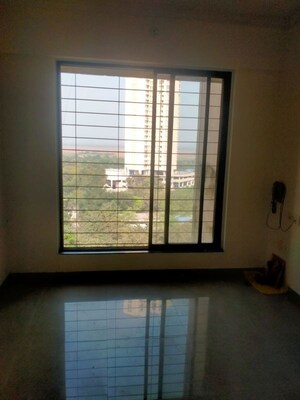 Room in 1 BHK Apartment at Unnathi Woods Phase 1 And 2, Ghodbunder Road – for Rent