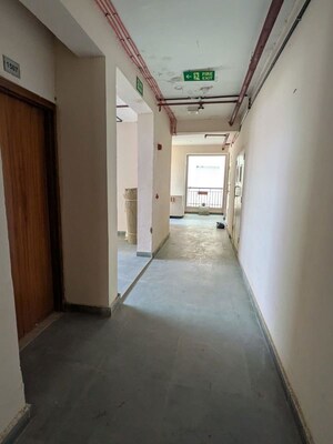 Building Lobby in 2 BHK Apartment at Amrapali Golf Homes, Sector 4 Greater Noida – for Sale