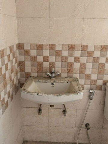 Bathroom in 2 BHK Apartment at Amrapali Golf Homes, Sector 4 Greater Noida – for Sale