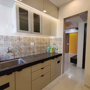 Kitchen in 2 BHK Apartment at Vijay Vatika, Kavesar – for Sale