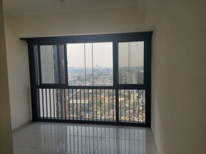 Room in 2 BHK Apartment at Kolte Patil Downtown Langston, Kharadi – for Rent