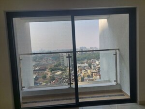 Room in 2 BHK Apartment at Kolte Patil Downtown Langston, Kharadi – for Rent