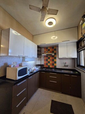 Kitchen in 2.5 BHK Apartment at Dosti Vijeta, Vartak Nagar – for Rent