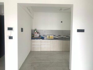 Kitchen in 2 BHK Apartment at Unique Youtopia, Kharadi – for Rent