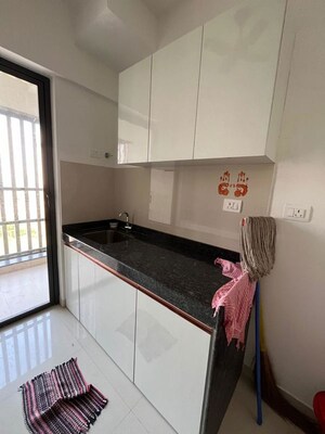 Kitchen in 2 BHK Apartment at Lodha Palava Downtown, Dombivli East – for Sale