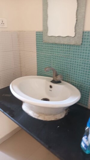 Bathroom in 2 BHK Apartment at Acumen Nakshatra, Baner – for Rent