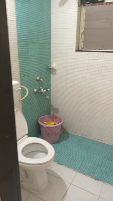 Bathroom in 2 BHK Apartment at Acumen Nakshatra, Baner – for Rent