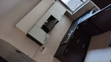 Kitchen in 3 BHK Apartment at Ansal API Esencia, Sector 67 – for Rent