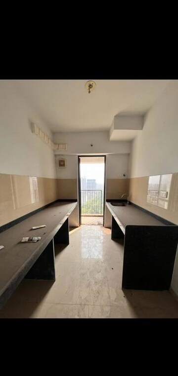 Kitchen in 1.5 BHK Apartment at Lodha Palava City Lakeshore Greens, Dombivli East – for Sale