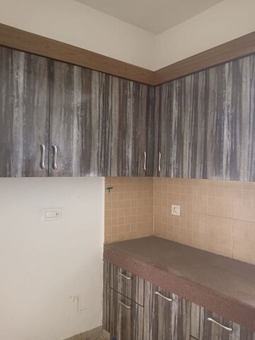 Kitchen in 4 BHK Builder Floor at Orchid Island, Sector 51 – for Sale