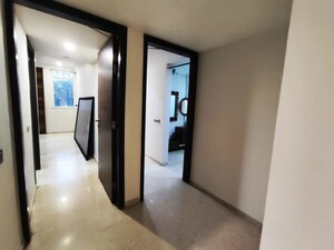 Living Room in 4 BHK Apartment at Hiranandani Brookhill, Ghodbunder Road – for Sale